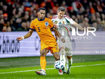 Netherlands defender Jurrien Timber and Hungary midfielder Tamas Nikitscher play during the match between the Netherlands and Hungary at the...