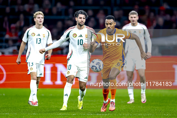 Hungary midfielder Dominik Szoboszlai and Netherlands midfielder Ryan Gravenberch play during the match between the Netherlands and Hungary...