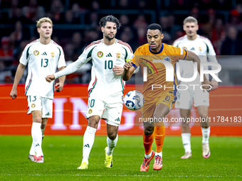 Hungary midfielder Dominik Szoboszlai and Netherlands midfielder Ryan Gravenberch play during the match between the Netherlands and Hungary...