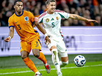 Netherlands defender Jurrien Timber and Hungary midfielder Tamas Nikitscher play during the match between the Netherlands and Hungary at the...