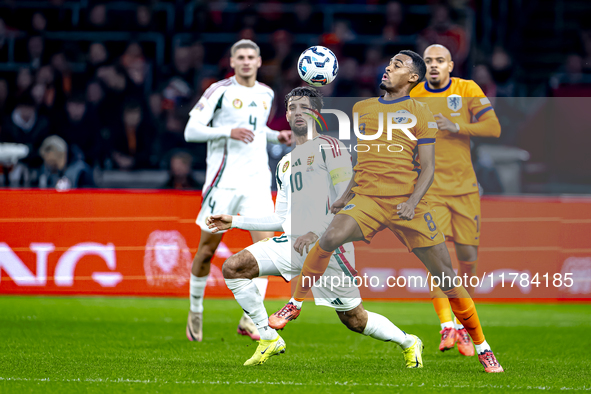 Hungary midfielder Dominik Szoboszlai and Netherlands midfielder Ryan Gravenberch play during the match between the Netherlands and Hungary...