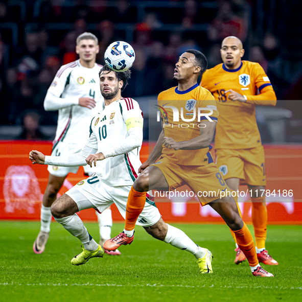 Hungary midfielder Dominik Szoboszlai and Netherlands midfielder Ryan Gravenberch play during the match between the Netherlands and Hungary...