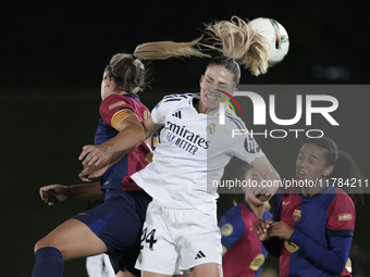 Melanie Leupolz of Real Madrid and Alexia Putellas of FC Barcelona fight for the ball during the LIGA F match between Real Madrid and FC Bar...