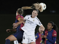 Melanie Leupolz of Real Madrid and Alexia Putellas of FC Barcelona fight for the ball during the LIGA F match between Real Madrid and FC Bar...