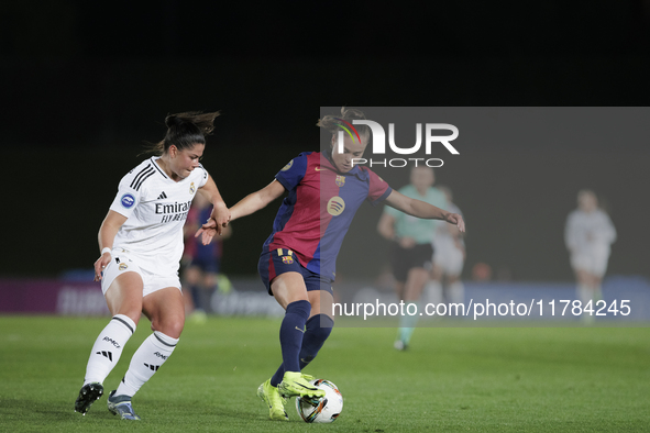 Ewa Pajor of FC Barcelona and Maria Mendez of Real Madrid fight for the ball during the LIGA F match between Real Madrid and FC Barcelona at...