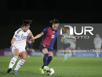 Ewa Pajor of FC Barcelona and Maria Mendez of Real Madrid fight for the ball during the LIGA F match between Real Madrid and FC Barcelona at...