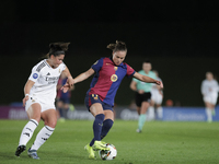 Ewa Pajor of FC Barcelona and Maria Mendez of Real Madrid fight for the ball during the LIGA F match between Real Madrid and FC Barcelona at...