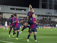 In Madrid, Spain, on November 16, Claudia Pina of FC Barcelona and Alexia Putellas of FC Barcelona celebrate a goal during the LIGA F match...