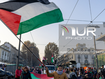 More than 1,000 people march through the center of Turin, Italy, on November 16, 2024, calling for a boycott of Israel and a ceasefire in th...