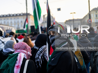 More than 1,000 people march through the center of Turin, Italy, on November 16, 2024, calling for a boycott of Israel and a ceasefire in th...