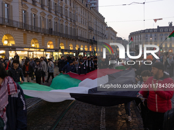 More than 1,000 people march through the center of Turin, Italy, on November 16, 2024, calling for a boycott of Israel and a ceasefire in th...