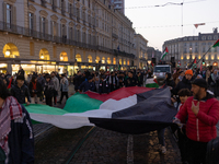 More than 1,000 people march through the center of Turin, Italy, on November 16, 2024, calling for a boycott of Israel and a ceasefire in th...