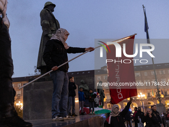 More than 1,000 people march through the center of Turin, Italy, on November 16, 2024, calling for a boycott of Israel and a ceasefire in th...