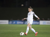 Olga Carmona of Real Madrid controls the ball during the LIGA F match between Real Madrid and FC Barcelona at Alfredo Di Stefano stadium in...