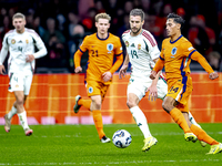 Hungary forward Barnabas Varga and Netherlands midfielder Tijjani Reijnders play during the match between the Netherlands and Hungary at the...