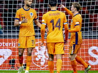 Netherlands forward Cody Gakpo scores the 2-0 and celebrates the goal during the match between the Netherlands and Hungary at the Johan Crui...