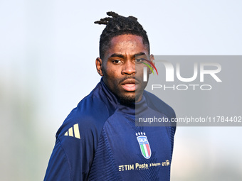 Caleb Okoli of Italy participates in an Italy training session at BPER Training Centre in Appiano Gentile on November 16, 2024, in Como, Ita...