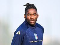 Caleb Okoli of Italy participates in an Italy training session at BPER Training Centre in Appiano Gentile on November 16, 2024, in Como, Ita...