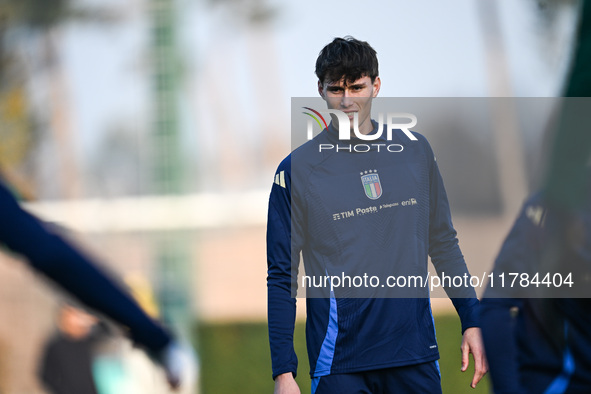 Pietro Comuzzo of Italy participates in an Italy training session at BPER Training Centre in Appiano Gentile on November 16, 2024, in Como,...