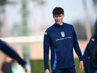 Pietro Comuzzo of Italy participates in an Italy training session at BPER Training Centre in Appiano Gentile on November 16, 2024, in Como,...