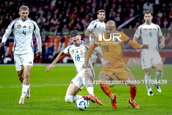 Hungary midfielder Zsolt Nagy and Netherlands forward Donyell Malen participate in the match between the Netherlands and Hungary at the Joha...