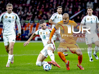 Hungary midfielder Zsolt Nagy and Netherlands forward Donyell Malen participate in the match between the Netherlands and Hungary at the Joha...