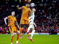 Netherlands defender Denzel Dumfries and Hungary midfielder Zsolt Nagy participate in the match between the Netherlands and Hungary at the J...