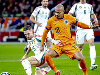 Hungary midfielder Zsolt Nagy and Netherlands forward Donyell Malen participate in the match between the Netherlands and Hungary at the Joha...