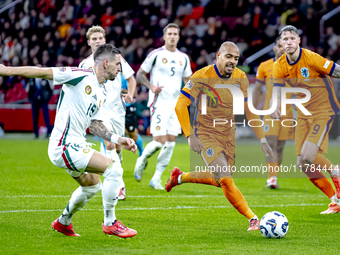 Hungary midfielder Zsolt Nagy and Netherlands forward Donyell Malen participate in the match between the Netherlands and Hungary at the Joha...