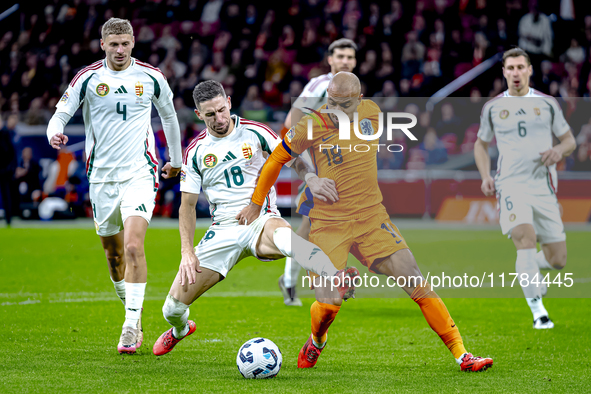 Hungary midfielder Zsolt Nagy and Netherlands forward Donyell Malen participate in the match between the Netherlands and Hungary at the Joha...