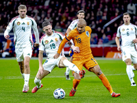 Hungary midfielder Zsolt Nagy and Netherlands forward Donyell Malen participate in the match between the Netherlands and Hungary at the Joha...