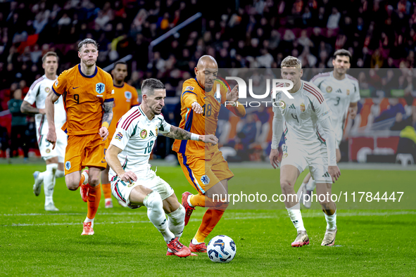 Hungary midfielder Zsolt Nagy and Netherlands forward Donyell Malen participate in the match between the Netherlands and Hungary at the Joha...