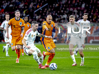 Hungary midfielder Zsolt Nagy and Netherlands forward Donyell Malen participate in the match between the Netherlands and Hungary at the Joha...