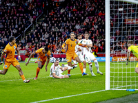 Netherlands forward Cody Gakpo, Netherlands defender Virgil van Dijk, and Netherlands defender Jurrien Timber are present during the match b...