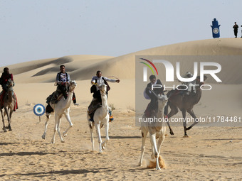 The photo, taken in Oued Souf, Algeria, on November 16, 2024, shows the Camel Festival during the 6th International Festival of Saharan Tour...