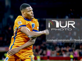 Netherlands defender Denzel Dumfries scores the 3-0 goal and celebrates during the match between the Netherlands and Hungary at the Johan Cr...