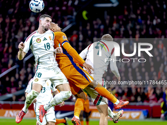 Hungary midfielder Zsolt Nagy and Netherlands forward Donyell Malen participate in the match between the Netherlands and Hungary at the Joha...