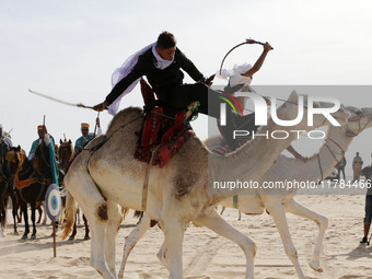 The photo, taken in Oued Souf, Algeria, on November 16, 2024, shows the Camel Festival during the 6th International Festival of Saharan Tour...