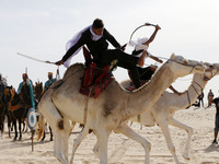 The photo, taken in Oued Souf, Algeria, on November 16, 2024, shows the Camel Festival during the 6th International Festival of Saharan Tour...