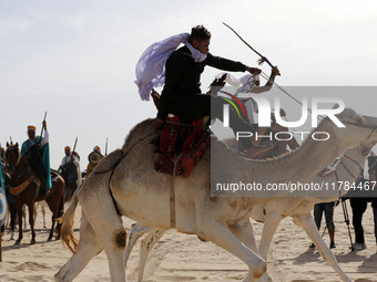 The photo, taken in Oued Souf, Algeria, on November 16, 2024, shows the Camel Festival during the 6th International Festival of Saharan Tour...