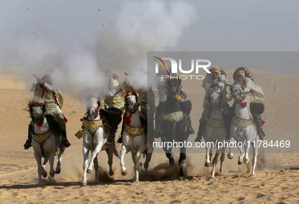 The photo, taken in Oued Souf, Algeria, on November 16, 2024, shows the Camel Festival during the 6th International Festival of Saharan Tour...