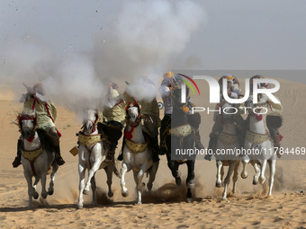 The photo, taken in Oued Souf, Algeria, on November 16, 2024, shows the Camel Festival during the 6th International Festival of Saharan Tour...