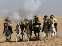 The photo, taken in Oued Souf, Algeria, on November 16, 2024, shows the Camel Festival during the 6th International Festival of Saharan Tour...