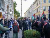 A demonstration in Munich, Germany, on November 16, 2024, includes pro-Palestinian demonstrators and pro-Israeli counter-demonstrators with...