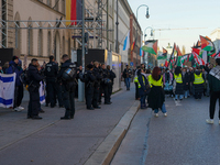 A demonstration in Munich, Germany, on November 16, 2024, includes pro-Palestinian demonstrators and pro-Israeli counter-demonstrators with...