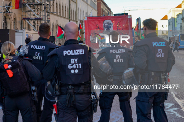 A demonstration in Munich, Germany, on November 16, 2024, includes pro-Palestinian demonstrators and pro-Israeli counter-demonstrators with...