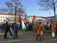 A demonstration in Munich, Germany, on November 16, 2024, includes pro-Palestinian demonstrators and pro-Israeli counter-demonstrators with...