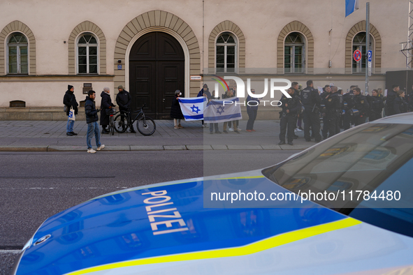 A demonstration in Munich, Germany, on November 16, 2024, includes pro-Palestinian demonstrators and pro-Israeli counter-demonstrators with...