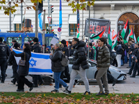 A demonstration in Munich, Germany, on November 16, 2024, includes pro-Palestinian demonstrators and pro-Israeli counter-demonstrators with...