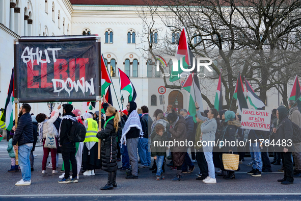 A demonstration in Munich, Germany, on November 16, 2024, includes pro-Palestinian demonstrators and pro-Israeli counter-demonstrators with...